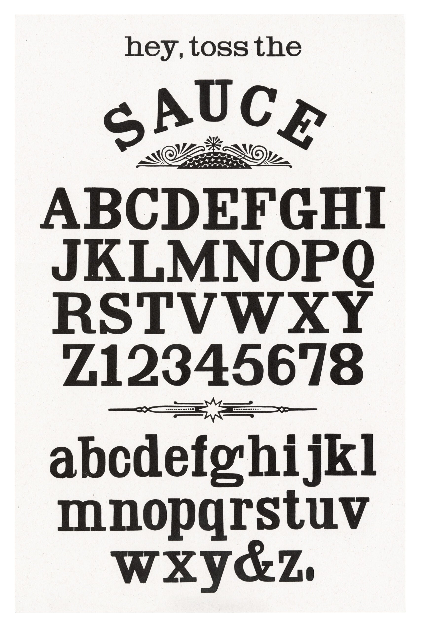 letterpress print wood type specimen from the Rob Roy Kelly American Wood Type Collection Folio Revisited, lowercase and uppercase letters, framed by ornaments printed in a single layer using black ink