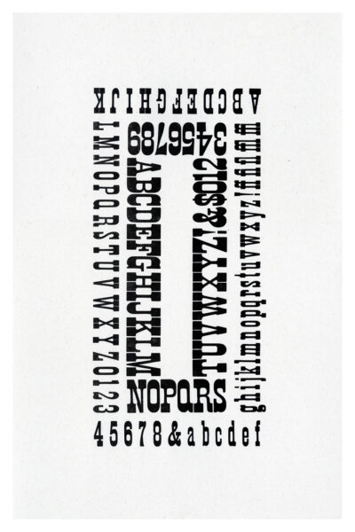 letterpress print specimen of wood type from the Rob Roy Kelly American Wood Type Collection Folio Revisited, two nested elongated rectangles of black letters going around the perimeter of the shape