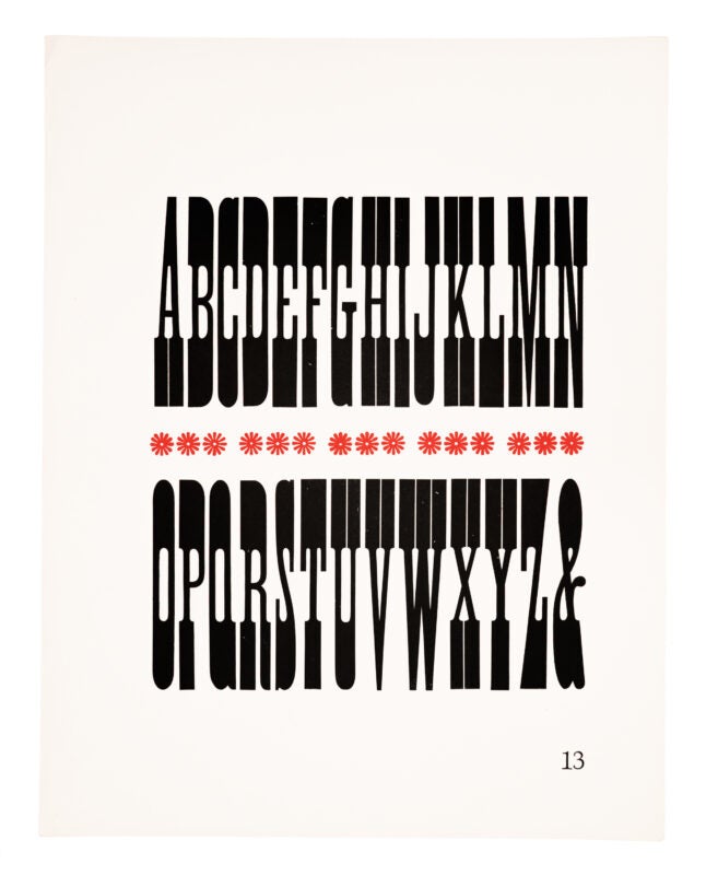 Antique-style typeface printed in black on white paper, with a red flower border in the middle.