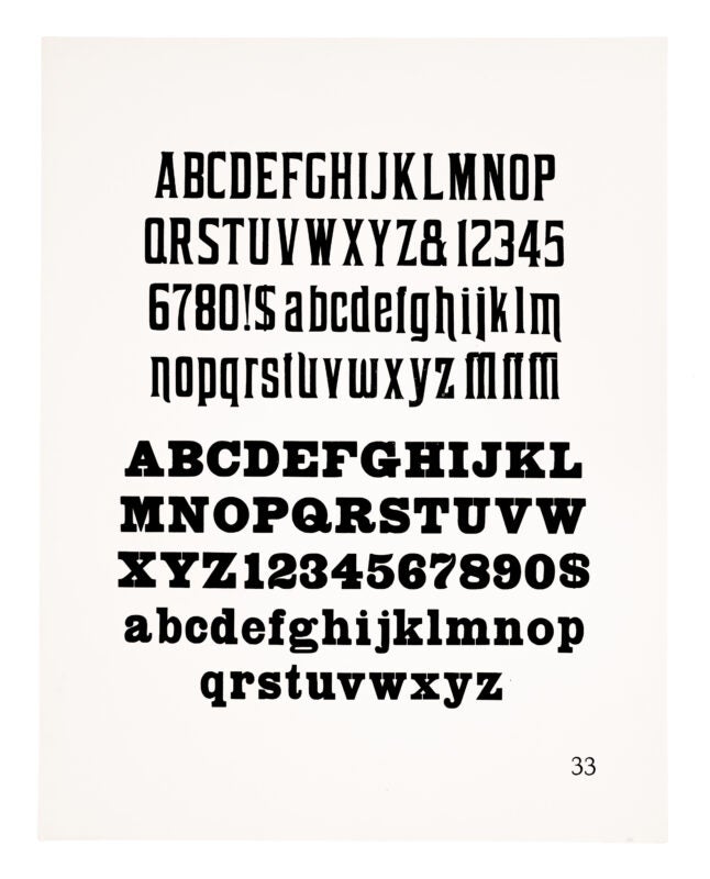 A gothic style and an antique-style typeface printed in black on white paper