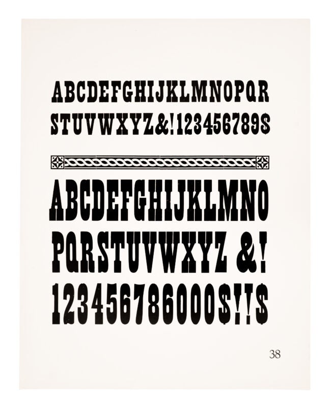 An antique font sits above an ornamental corkscrew border. A larger antique font sits below. Printed in black on white paper.