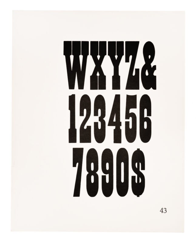 Capital “W-Z” and “&, 0-9, $” displayed in an antique typeface. Printed black on white paper.