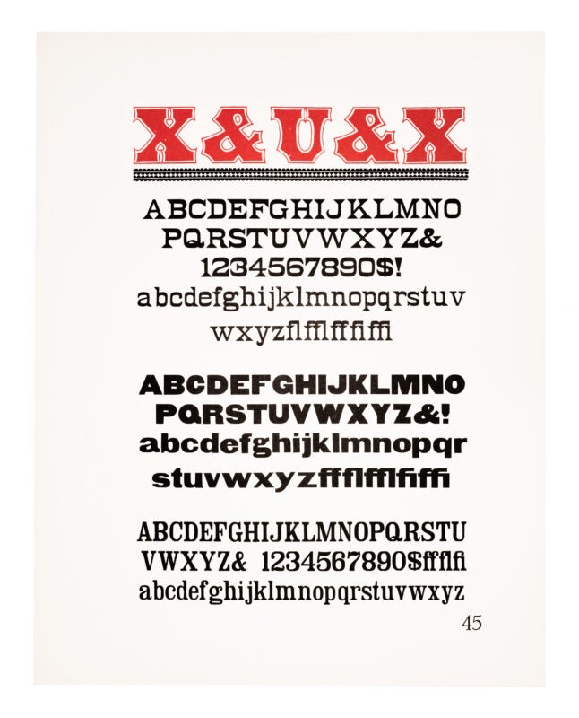 A large antique typeface displaying “X&U&X” printed atop the page in red on white paper. Beneath, a dotted ornamental line underlines the letters. An antique typeface sits underneath, then a gothic linear typeface in the middle, and a different antique typeface sits at the bottom. All printed in black on white paper.
