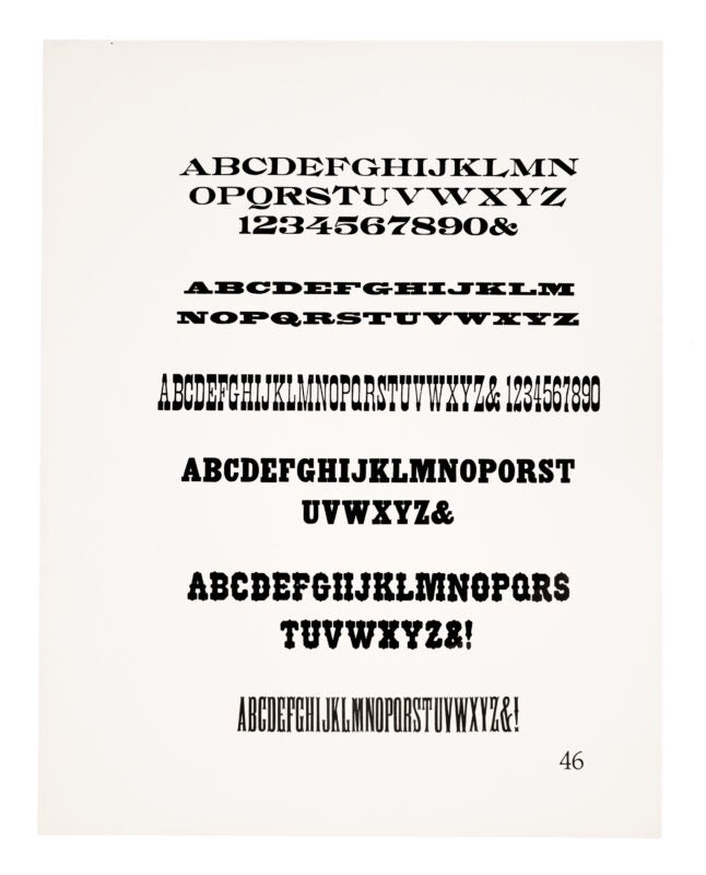 Six typefaces sit on the paper. From the top, a roman typeface, then five different antique typefaces. All printed in black on white paper.