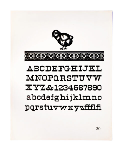 A page from American Wood Types, 1828-1900, Volume I, featuring Tuscan type printed in black on white paper. Also included is a cloud of letters, images, and ornamental details in a variety of styles, printed in red at the top of the page.