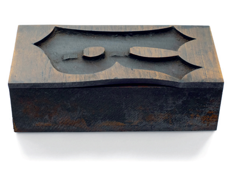 wood type block of letter R made using the veneer method from the side