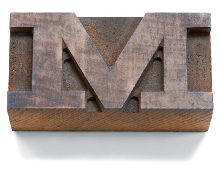 wood type block of letter M made using the router cut method from above